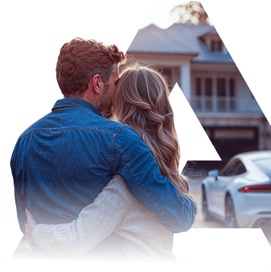 young family against the backdrop of a new house and car